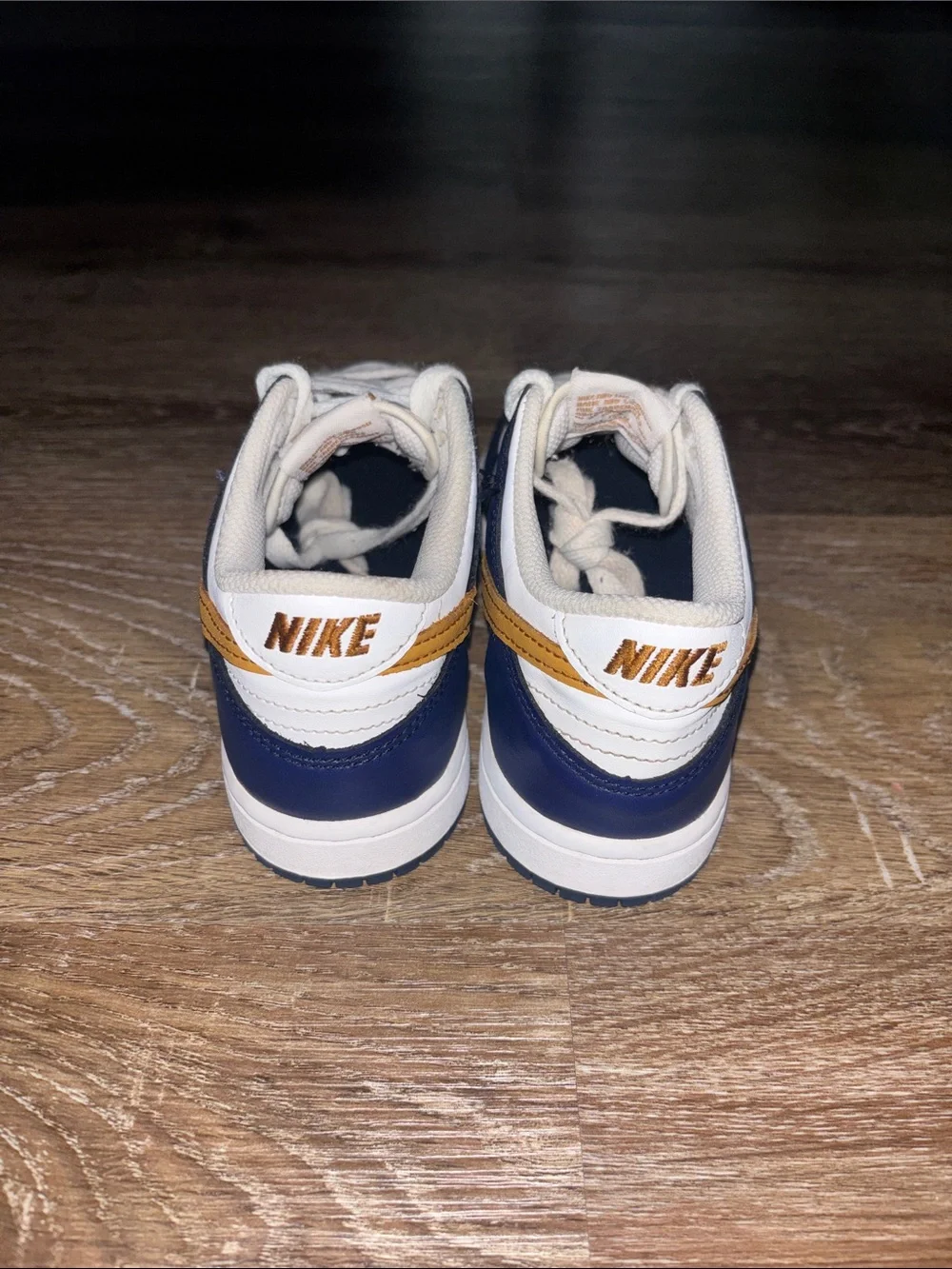 Nike Low-Top Sneakers in Navy, White & Gold